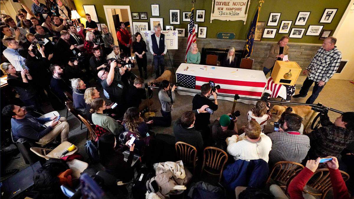 Residents of Dixville Notch, a small community in New Hampshire, cast the first votes in the state’s primary. (AP Photo/Robert F. Bukaty)