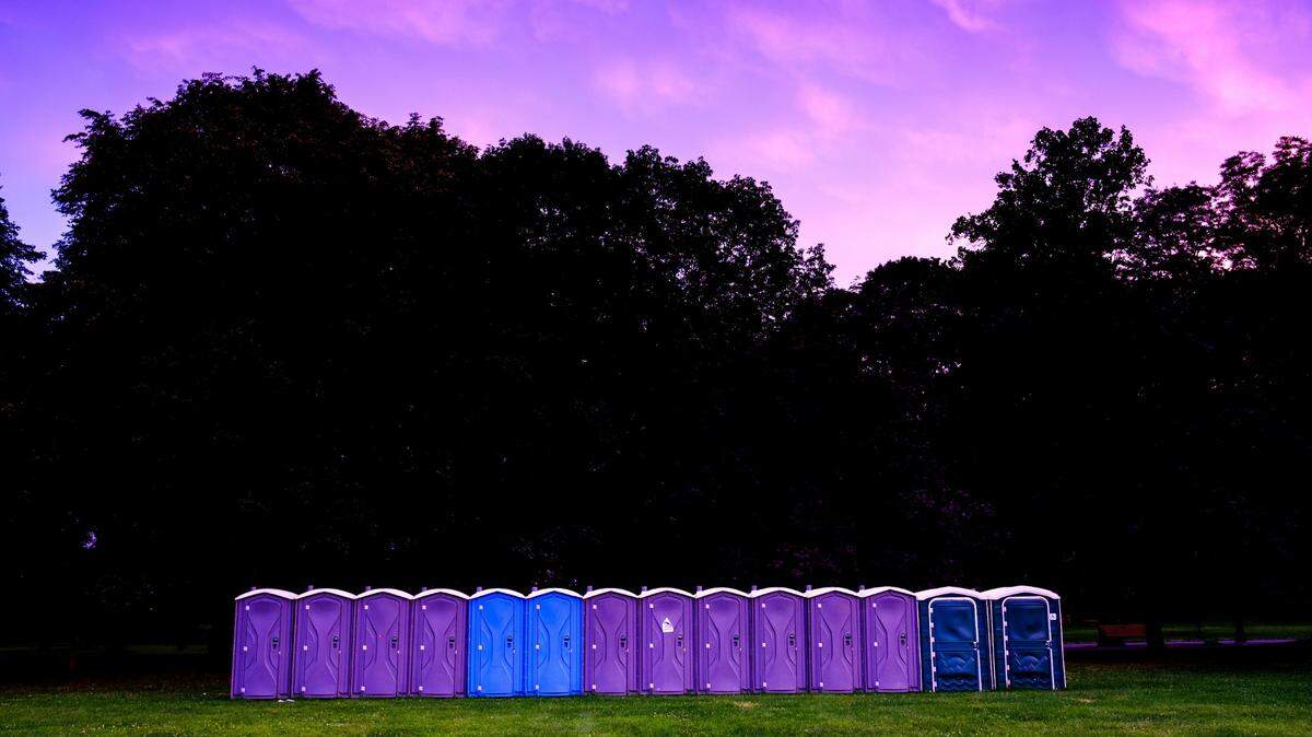 An 18-year-old man is accused of tipping over a port-a-potty, trapping a mom and 4-year-old girl inside, New Hampshire police say.