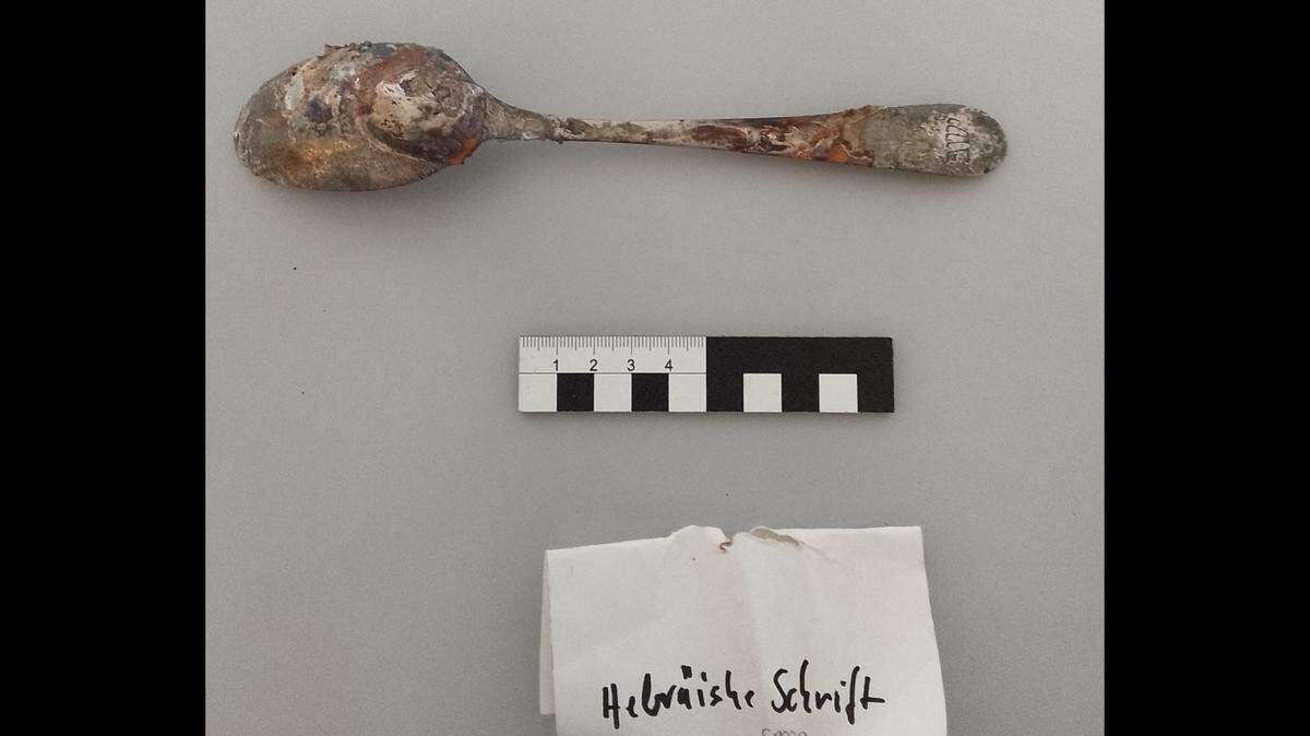 A variety of Jewish artifacts were recently found buried in a pit near a former Nazi concentration camp, German officials said.