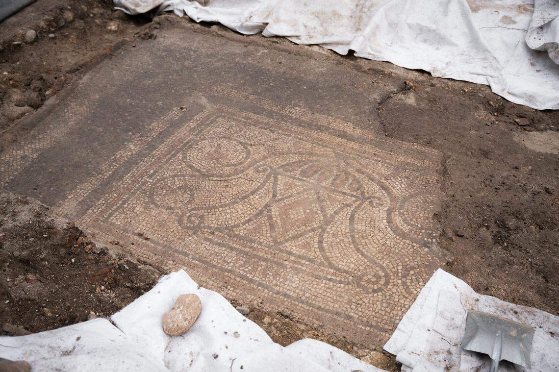 One mosaic depicts an ancient wine-making vessel with curved handles, officials said.