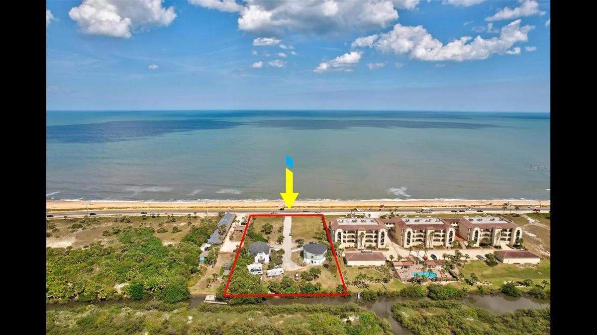A real estate agent scammed a couple in their 60s and willed himself oceanfront property in Flagler Beach when one of the men died, Florida law enforcement said.