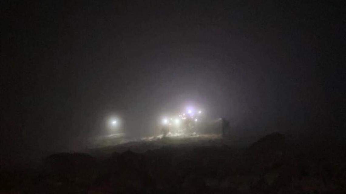 A team of 20 rescuers trudged through dangerous weather conditions to save an injured hiker on a New Hampshire mountain, photos show.