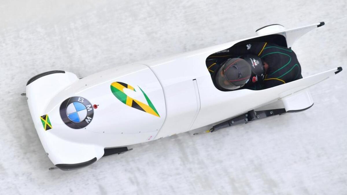 Jazmine Fenlator-Victorian and Carrie Russell of Jamaica speed down the track during their first run of the women's bobsled World Cup race in Decembed 2017.