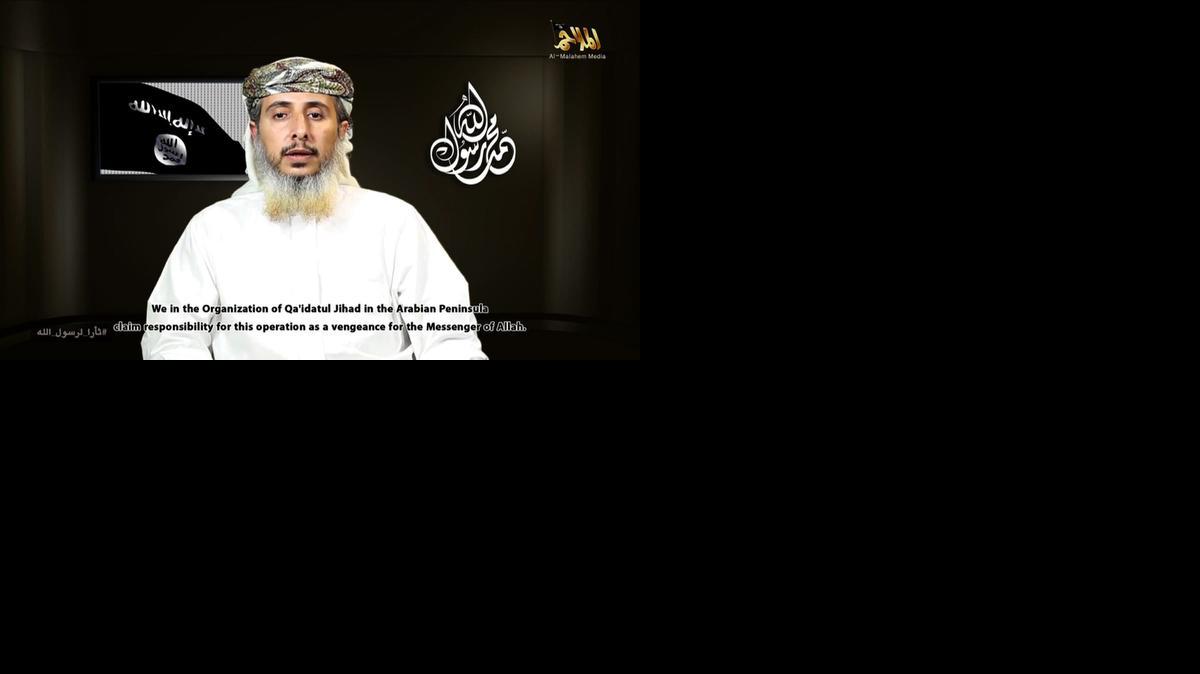 
This still image grab taken off a propaganda video posted online on Jan. 14, 2015, by Al-Malahem Media, the media arm of Al-Qaida in the Arabian Peninsula (AQAP), purportedly shows one of the group's leaders, Nasir bin Ali al-Ansi delivering a video message from an undisclosed location and claiming responsibility for the attack on the French satirical magazine Charlie Hebdo's offices in Paris.
