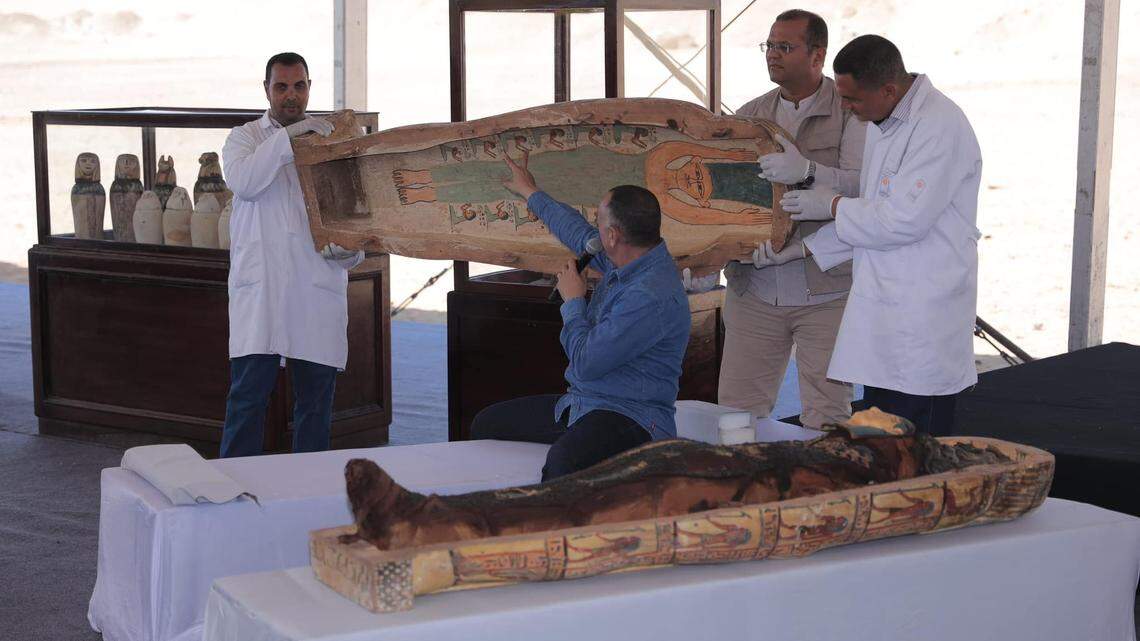 An ancient Egyptian cemetery was uncovered, revealing well-preserved mummies and hundreds of artifacts, officials said.