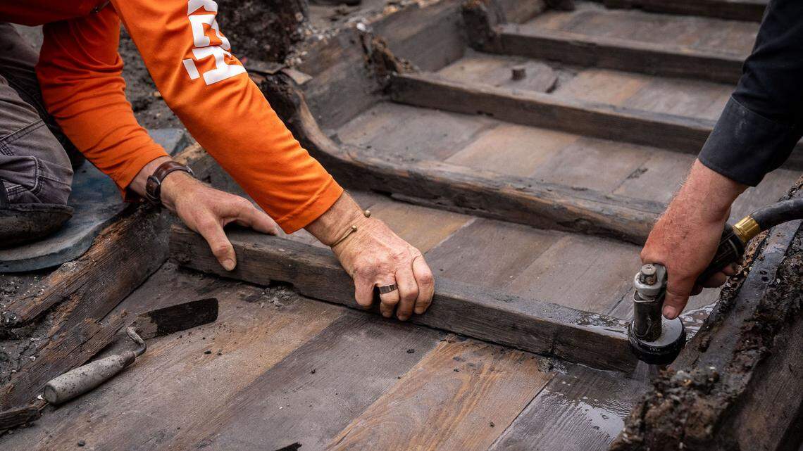 After construction crews uncovered a historical ship in St. Augustine, Florida, archaeologists began excavating it. They used water to de-construct the boat and remove each piece from the construction site.
