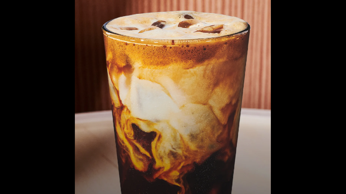 The iced apple crisp oat milk shaken espresso is pictured.
