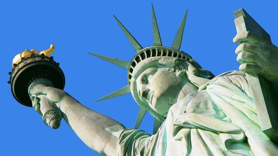 Should the poem on the Statue of Liberty guide U.S. immigration policy? Americans are divided, according to a new poll.