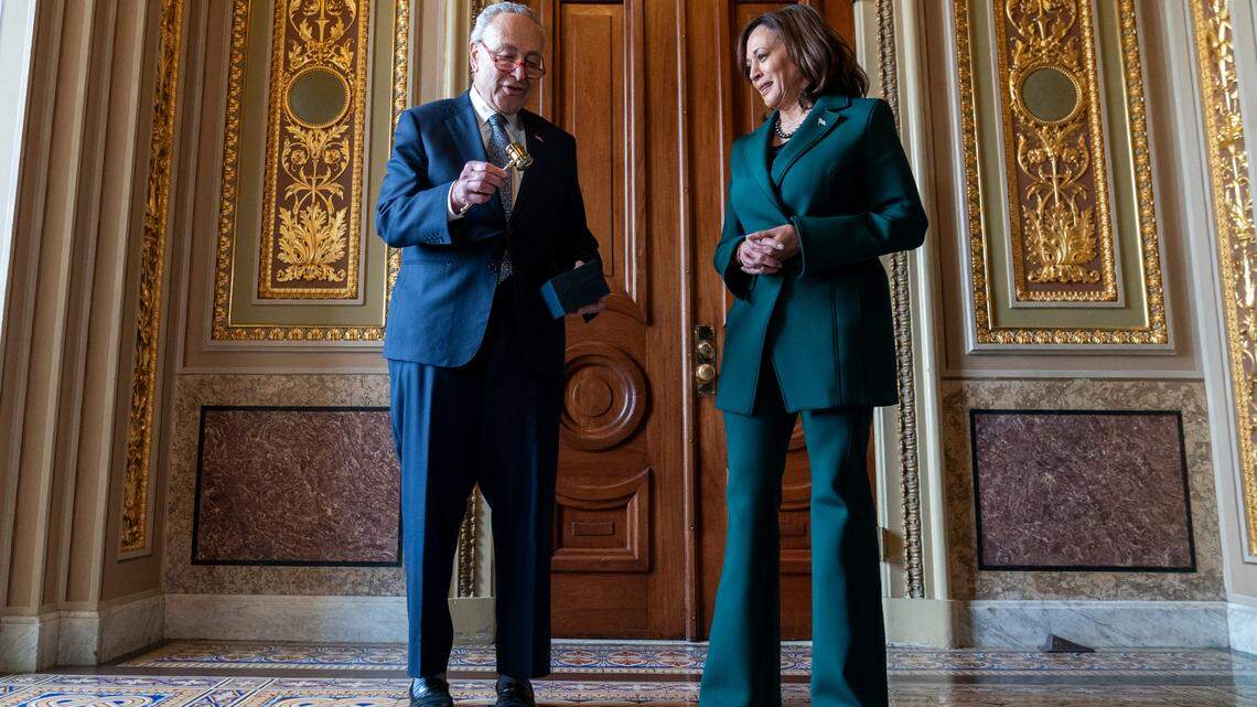 Senate Majority Leader Sen. Chuck Schumer, D-N.Y., presents Vice President Kamala Harris with a golden gavel after she cast the 32nd tie-breaking vote in the Senate, the most ever cast by a vice president, Tuesday, Dec. 5, 2023, on Capitol Hill in Washington. (AP Photo/Stephanie Scarbrough)