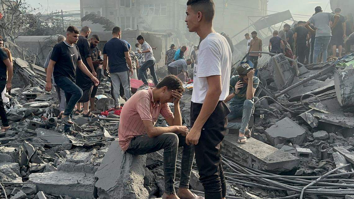 Palestinians look for survivors following Israeli airstrike in Nusseirat refugee camp, Gaza Strip, Tuesday, Oct. 31, 2023. (AP Photo/Doaa AlBaz)