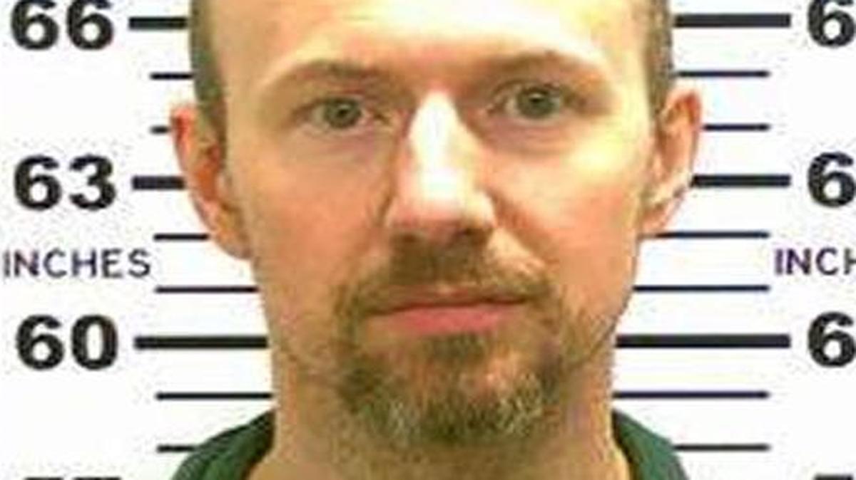 
FILE - At left, in a May 21, 2015, file photo released by the New York State Police is David Sweat. 
