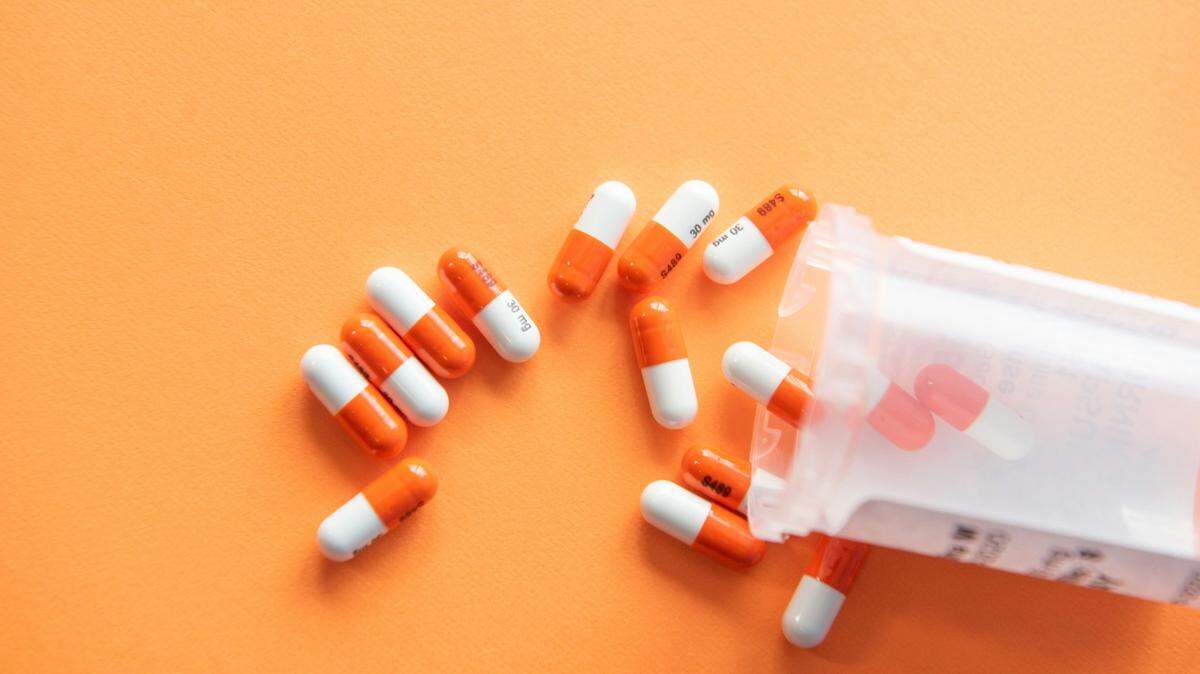 President Joe Biden unveiled a plan to manufacture “essential medicines” in the United States by invoking the Defense Production Act.
