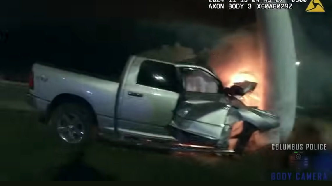 An Ohio police officer rescued a man from a burning truck after he crashed on a Columbus interstate.
