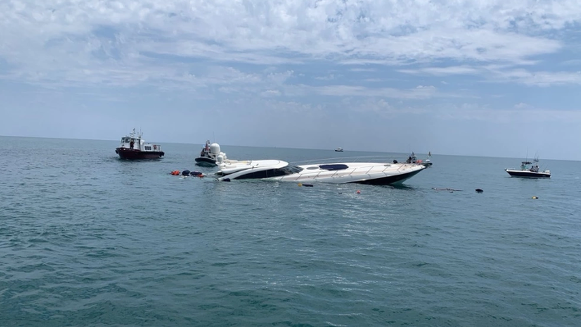 Two people were rescued from a sinking 80-foot yacht near St. Augustine, the Coast Guard said.