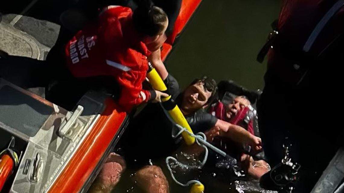 A man jumped into a frigid New York harbor after his dog fell off the pier, but they both needed rescue after he struggled to stay afloat.