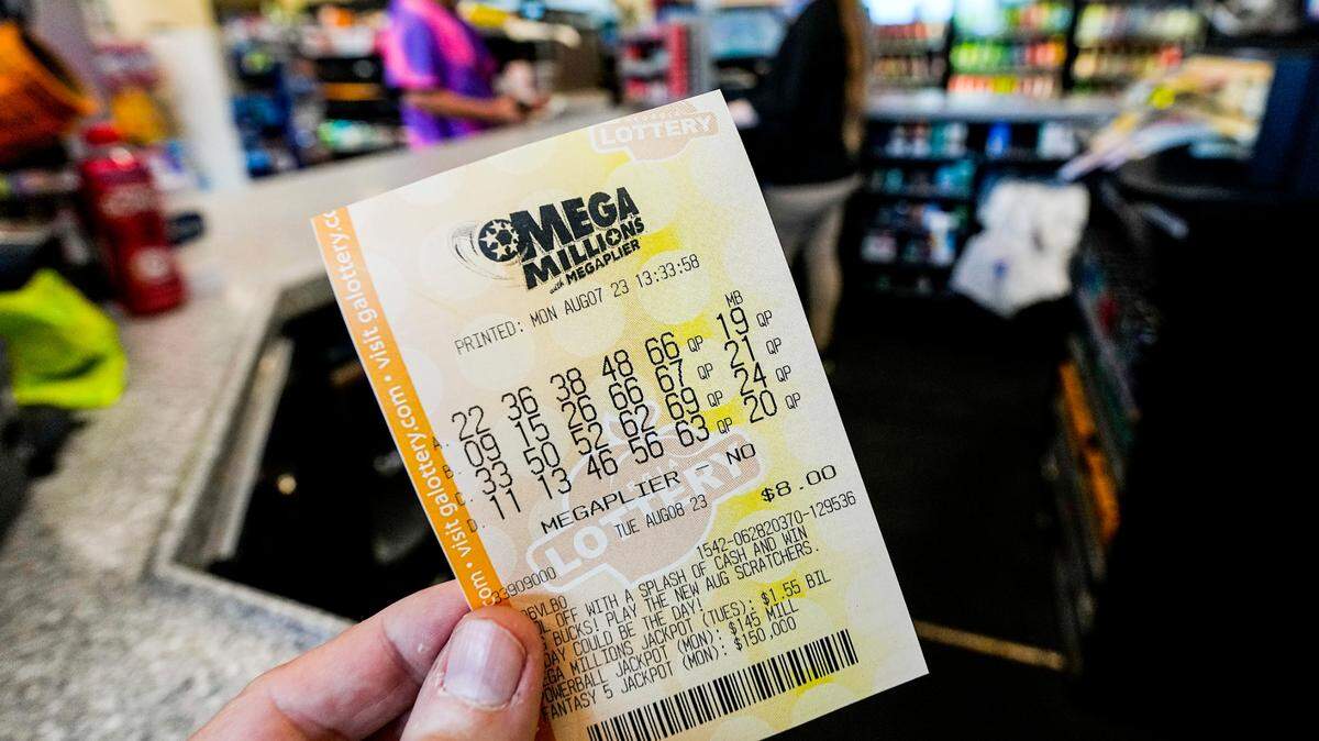 FILE - Two winning $1 million Mega Millions tickets were sold in Georgia ahead of the March 26 drawing. (AP Photo/Mike Stewart, File)