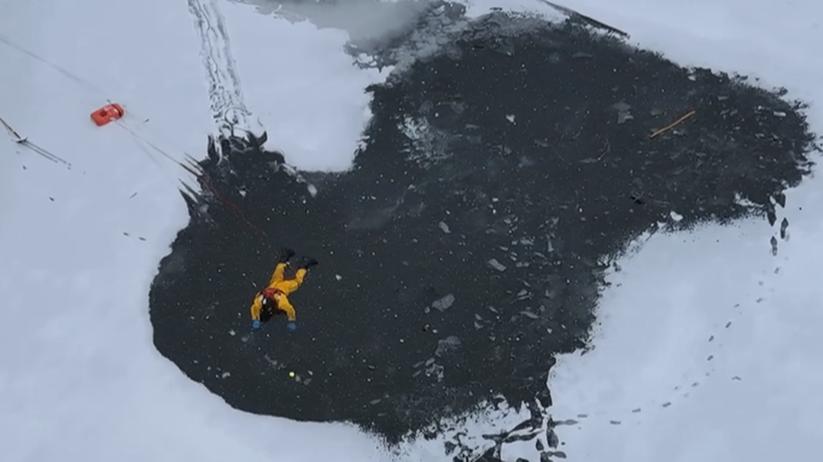 On Jan. 6, ranger Nate Laymon crawled across Basswood Pond in New York to rescue two brothers who had fallen through the ice.