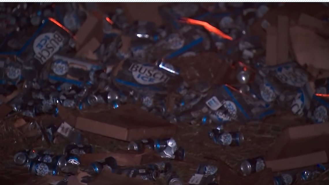 Cans of Busch Ice beer littered the side of Interstate 285 after a big rig overturned in Georgia, officials said.