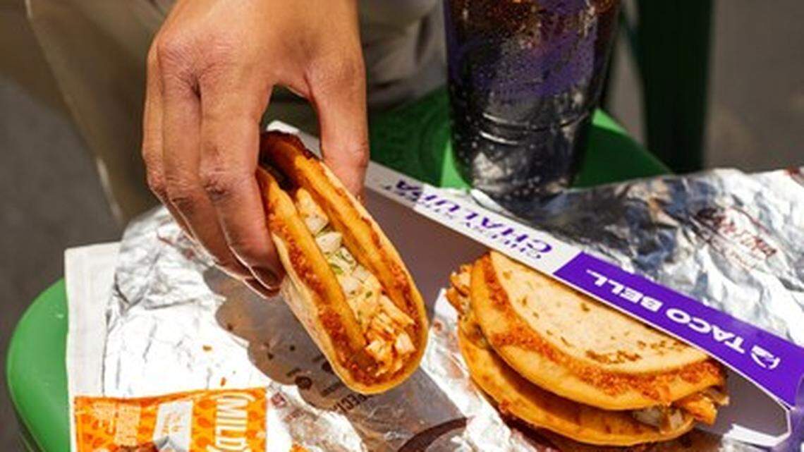 Taco Bell’s new cheesy street chalupas are available in two varieties: slow-roasted Cantina chicken or grilled, marinated steak.