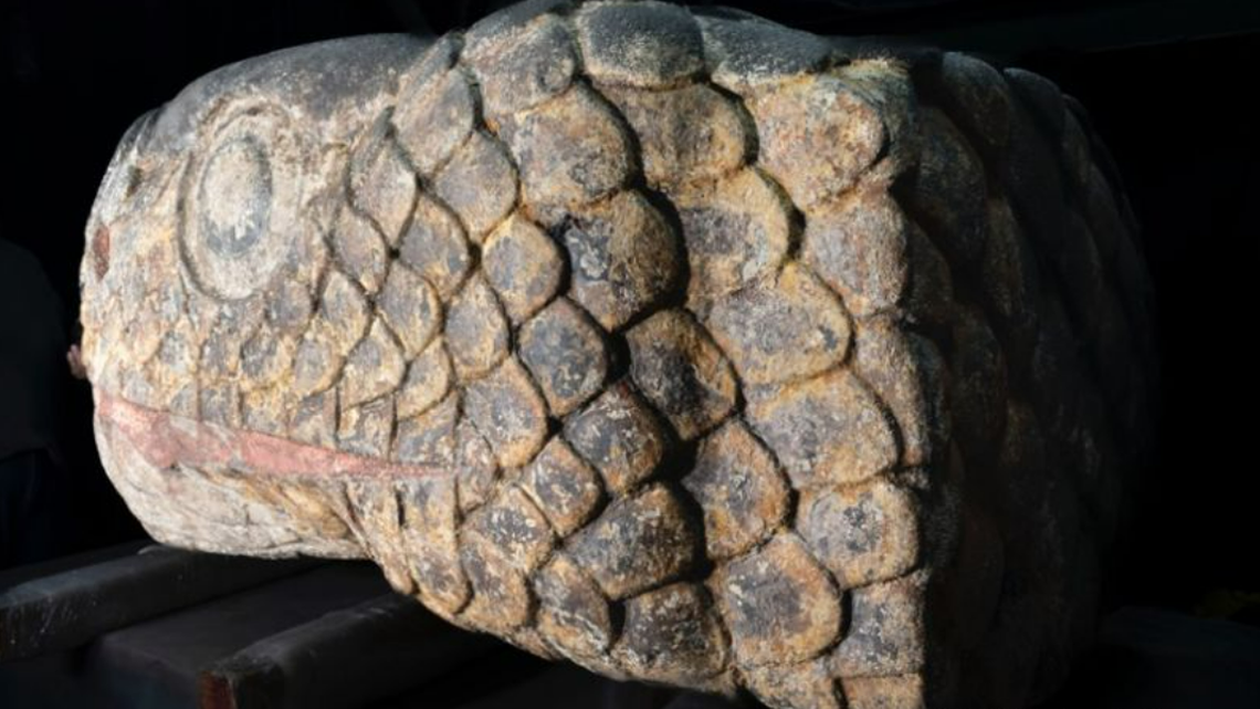 A large stone snake head dating to the Aztec Empire was discovered in Mexico after an earthquake, officials said.