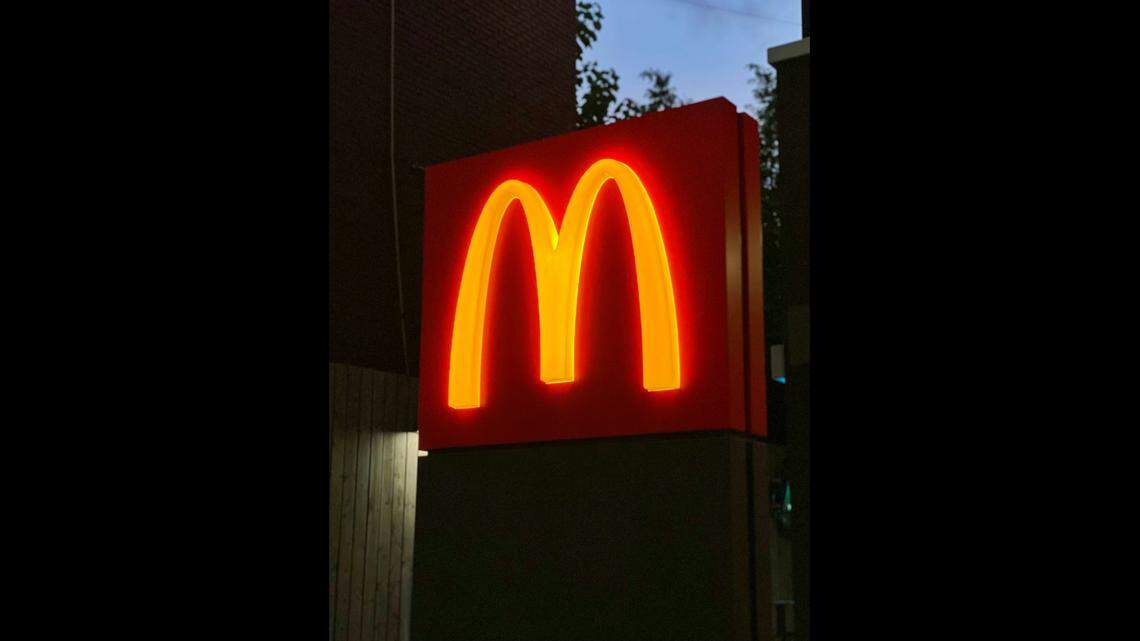 An altercation at a McDonald’s spilled into a nearby parking lot, where a man is accused of assaulting another man with a gun, Florida authorities said.