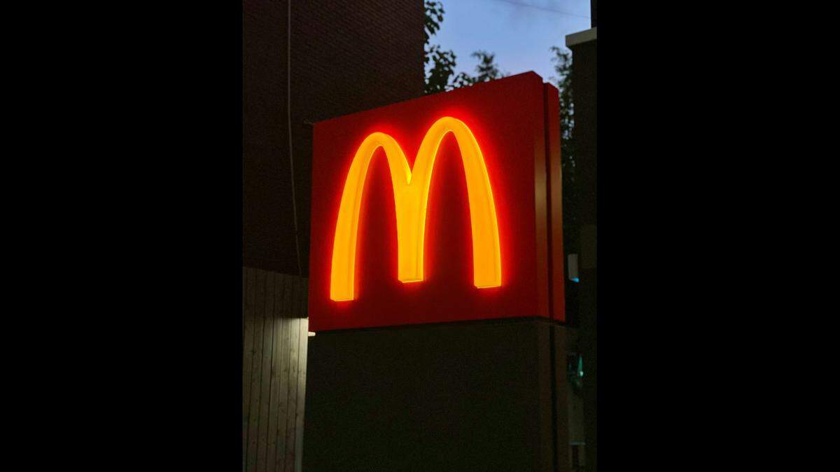 An altercation at a McDonald’s spilled into a nearby parking lot, where a man is accused of assaulting another man with a gun, Florida authorities said.
