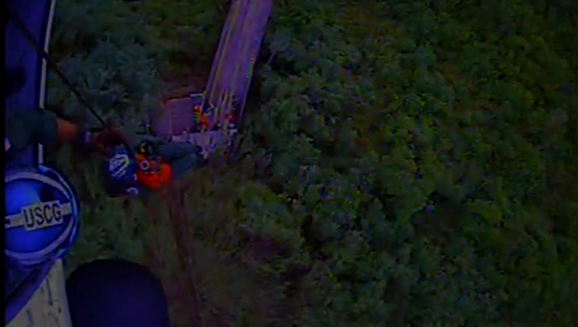 Rescuers secured the injured riders in litters and lifted them to safety.