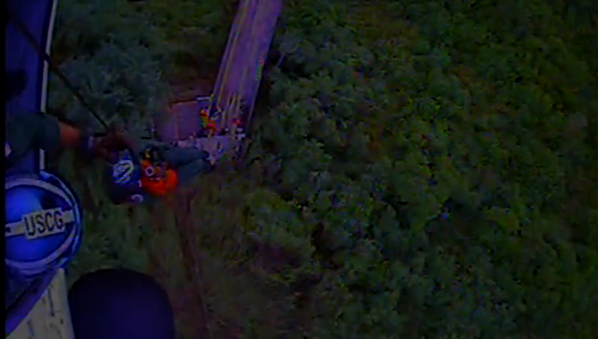 Rescuers secured the injured riders in litters and lifted them to safety.
