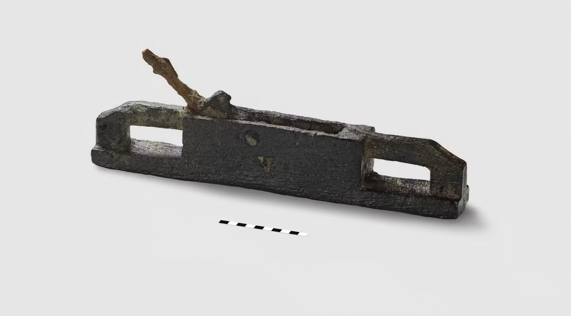 A well-preserved tool with an inset iron blade