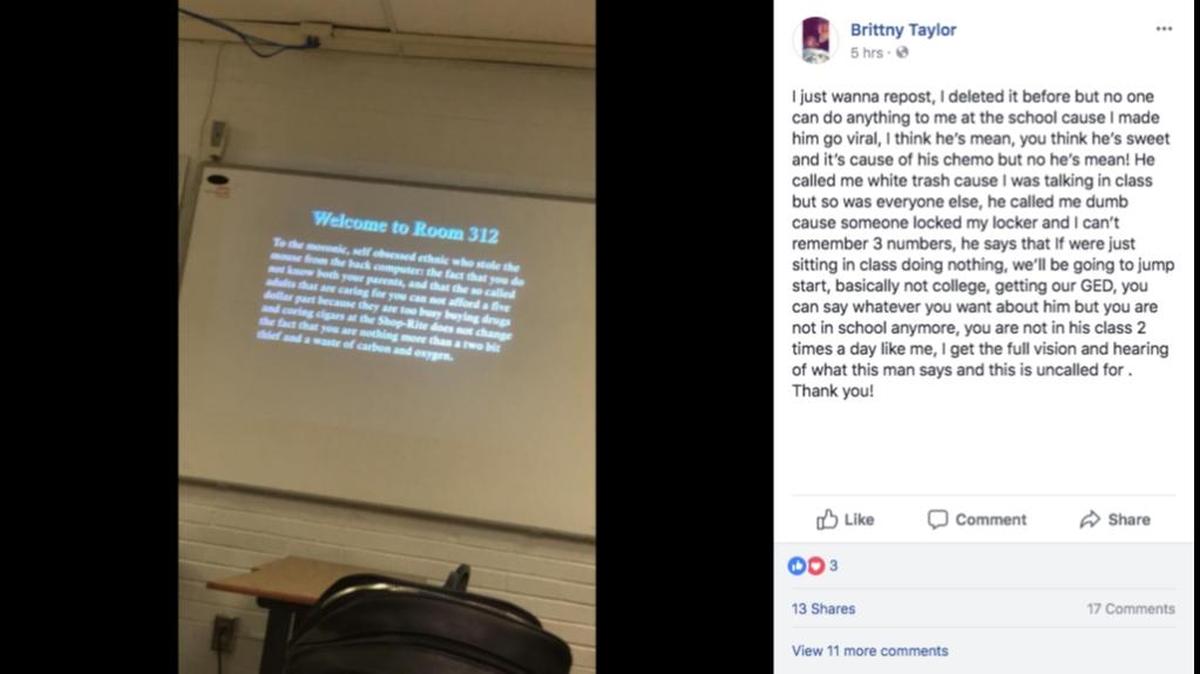 A teacher is under investigation for racially-charged message projected in his classroom.