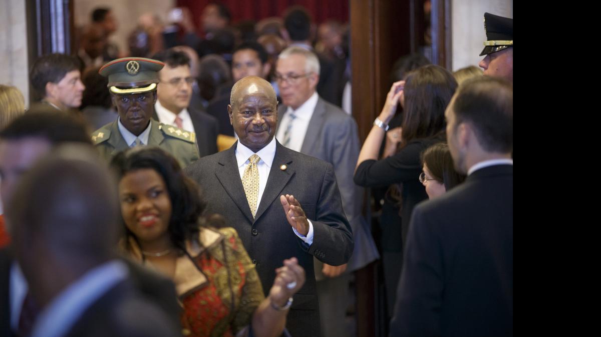 
President Yoweri Museveni of Uganda, center, departs a reception for leaders attending the US Africa Summit on Capitol Hill in Washington, Monday, Aug. 4, 2014. The gathering was hosted by the Senate Foreign Relations Committee and the House Foreign Affairs Committee. President Barack Obama and his administration are trying to strengthen ties with Africa, grappling with issues such as investment, poverty, terrorism, corruption and deadly diseases. 
