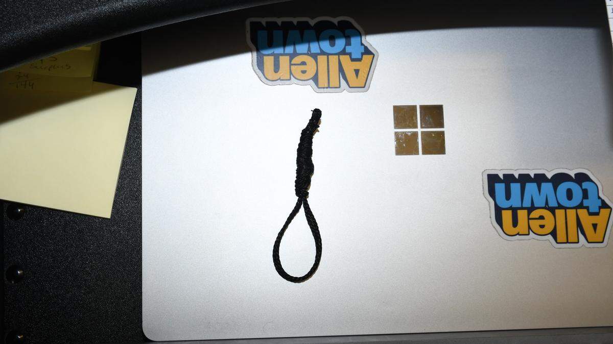 Authorities say a city worker planted a noose at her desk and blamed others for it.
