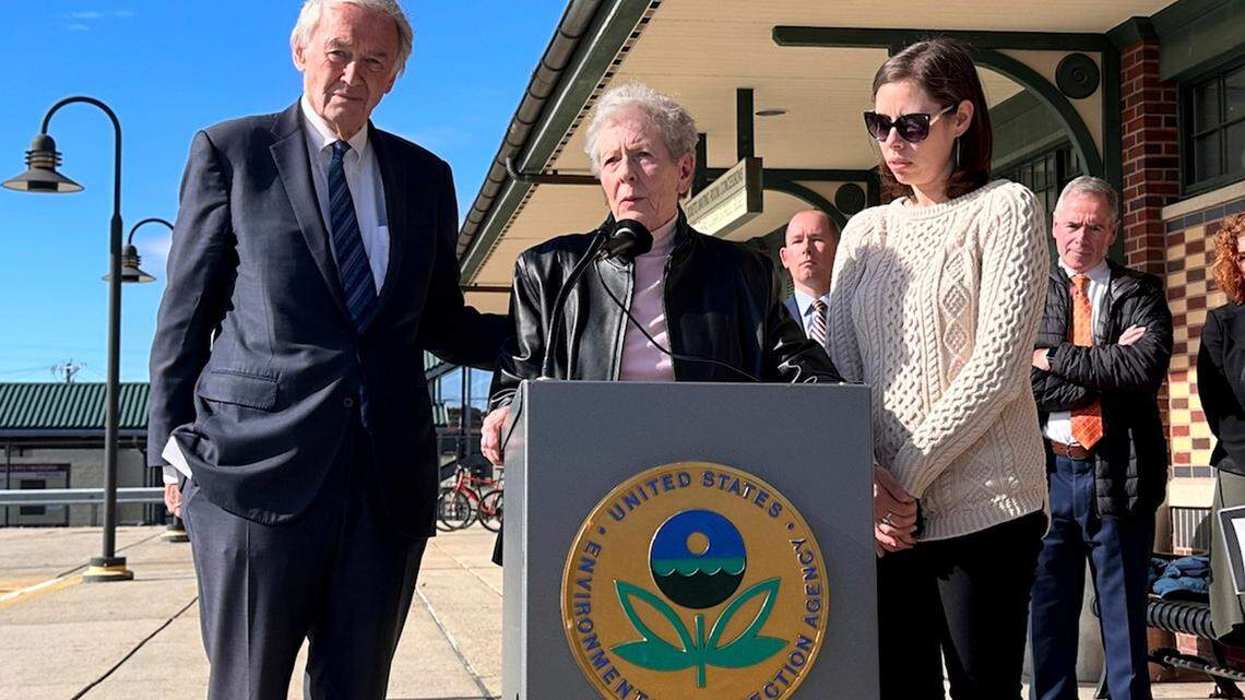 Massachusetts Sen. Edward Markey, left, stands in support of Anne Anderson, whose son died of leukemia in 1981 and was exposed to water contaminated with the chemical trichloroethylene, or TCE. (AP Photo/Michael Casey)