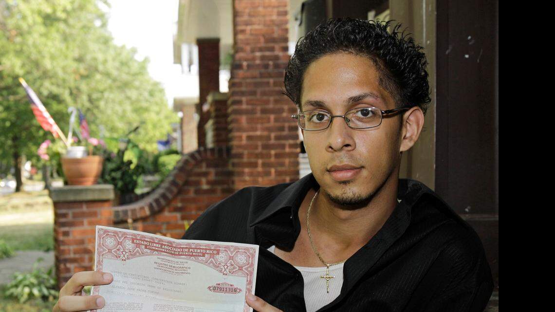 
In this photo from 2010, Puerto Rico's Alfredo Pagan shows his birth certificate in Cleveland after the licensing office in the city of Ohio prohibited him from obtaining a state identification card. The state rejected the request because Pagan’s birth certificate had become invalid after Puerto Rico required people born on the island to obtain a new “security-enhanced” certificate.
