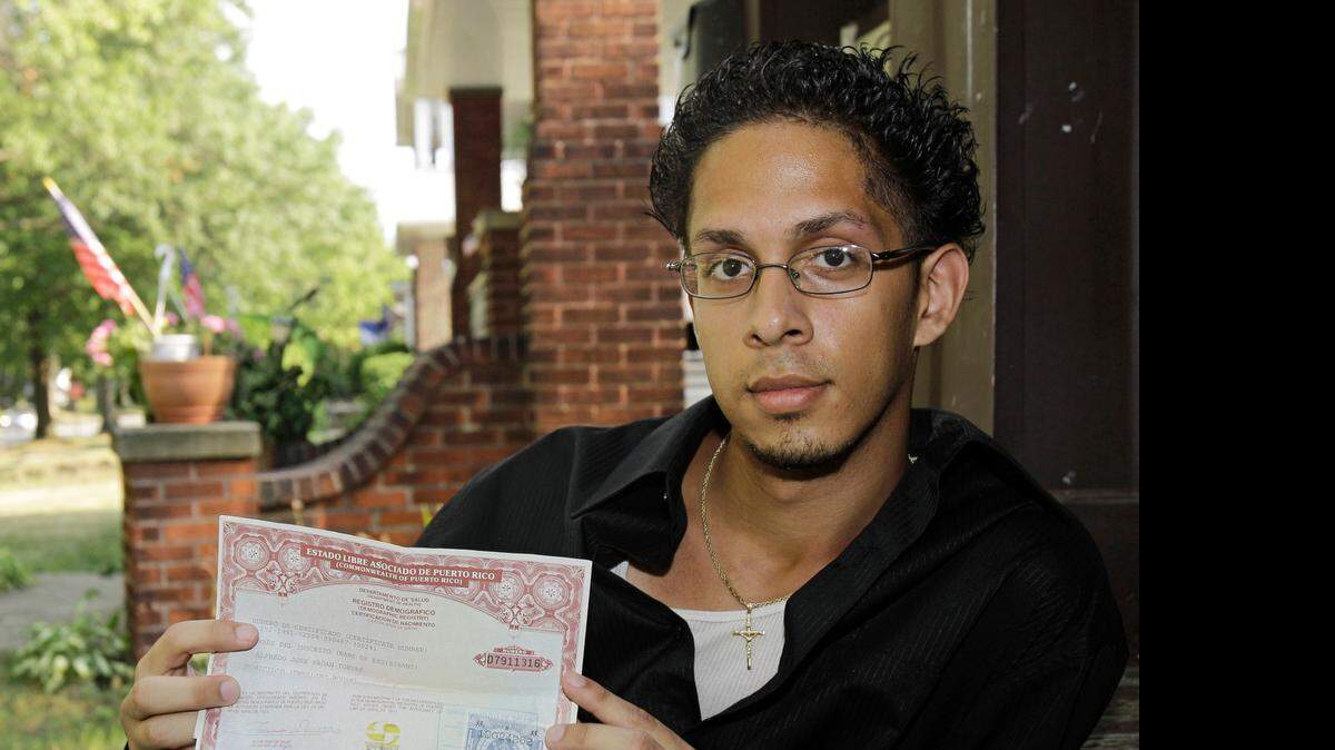 
In this photo from 2010, Puerto Rico's Alfredo Pagan shows his birth certificate in Cleveland after the licensing office in the city of Ohio prohibited him from obtaining a state identification card. The state rejected the request because Pagan’s birth certificate had become invalid after Puerto Rico required people born on the island to obtain a new “security-enhanced” certificate.
