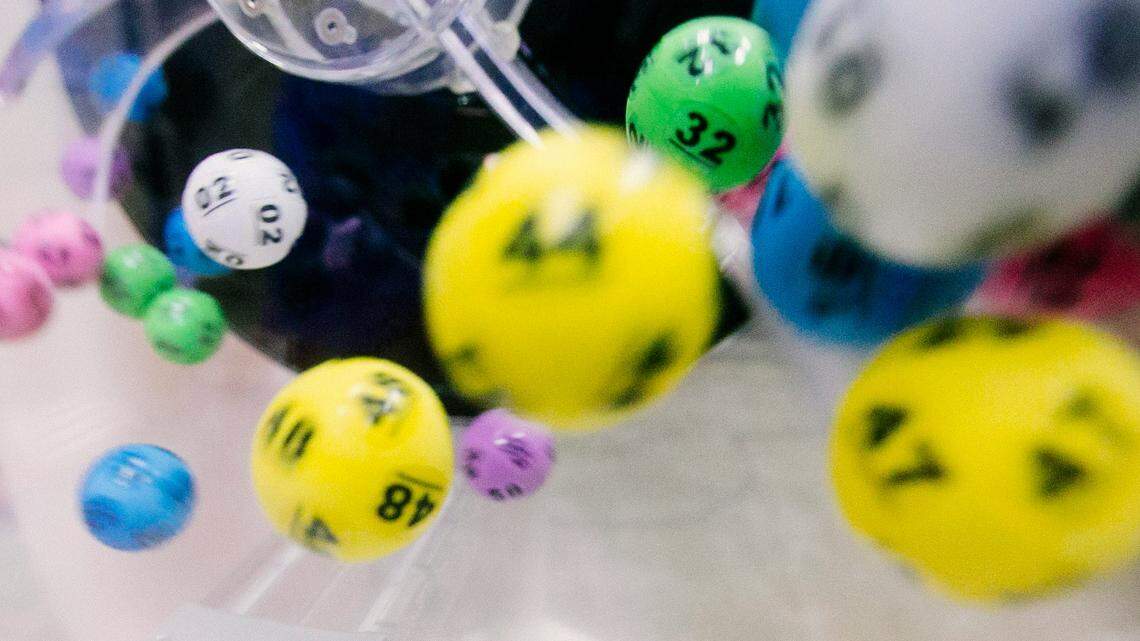 A man checked his lottery ticket during a "boring" work call and found out he won.
