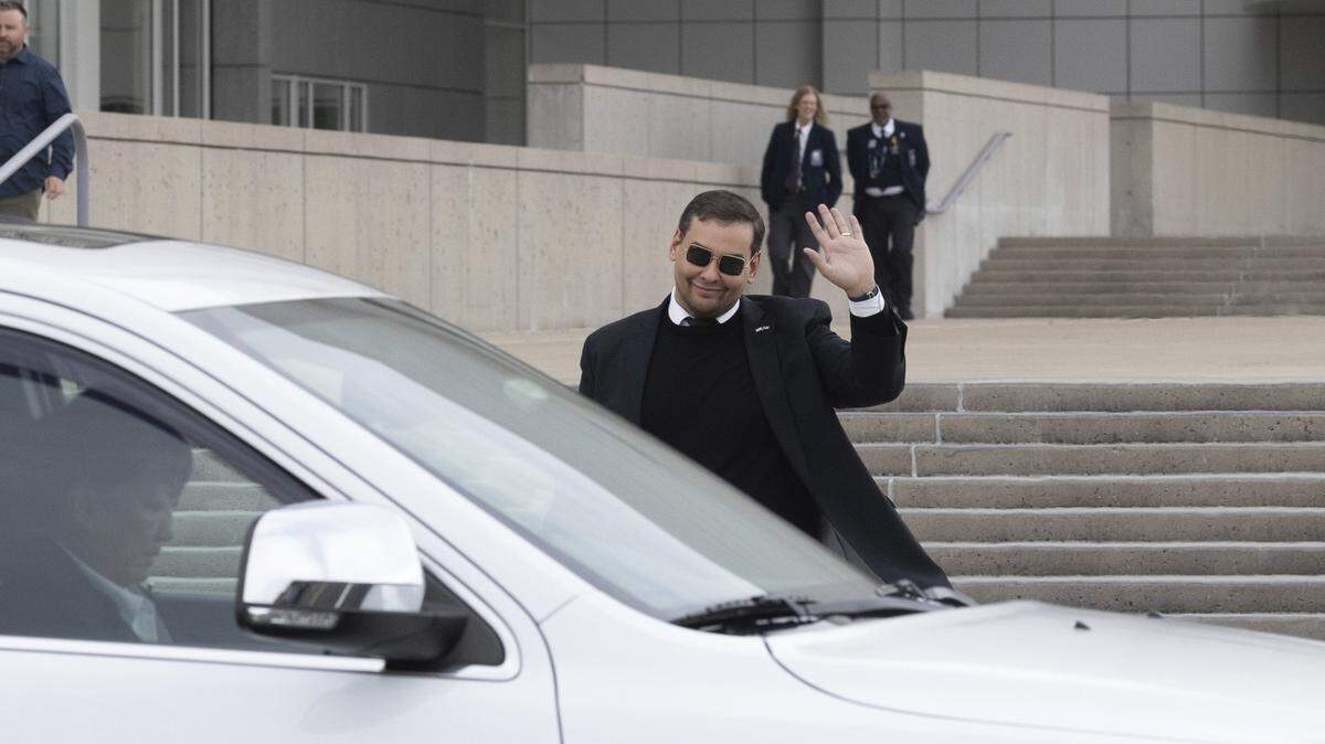 U.S. Rep. George Santos leaves the federal courthouse in Central Islip, New York, on Friday Oct. 27, 2023. Thirty-one Democrats voted against expelling him from Congress.