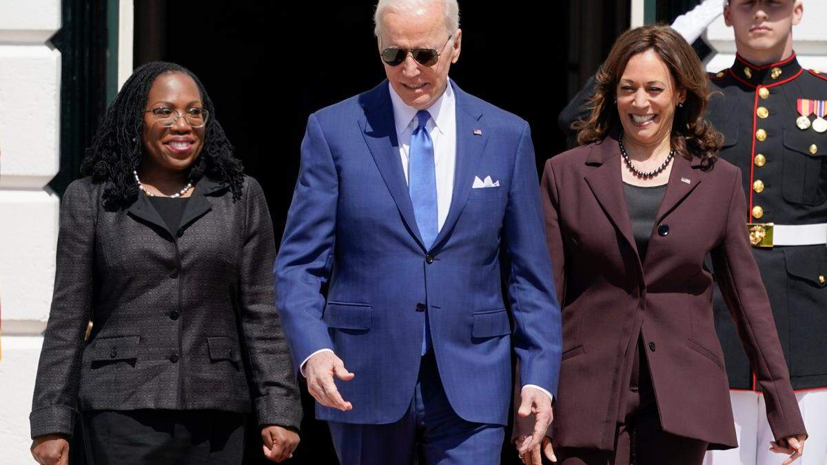 President Joe Biden, accompanied by Judge Ketanji Brown Jackson and Vice President Kamala Harris, walks to speak at an event on the South Lawn of the White House in April 8, celebrating the confirmation of Jackson as the first Black woman to reach the Supreme Court.