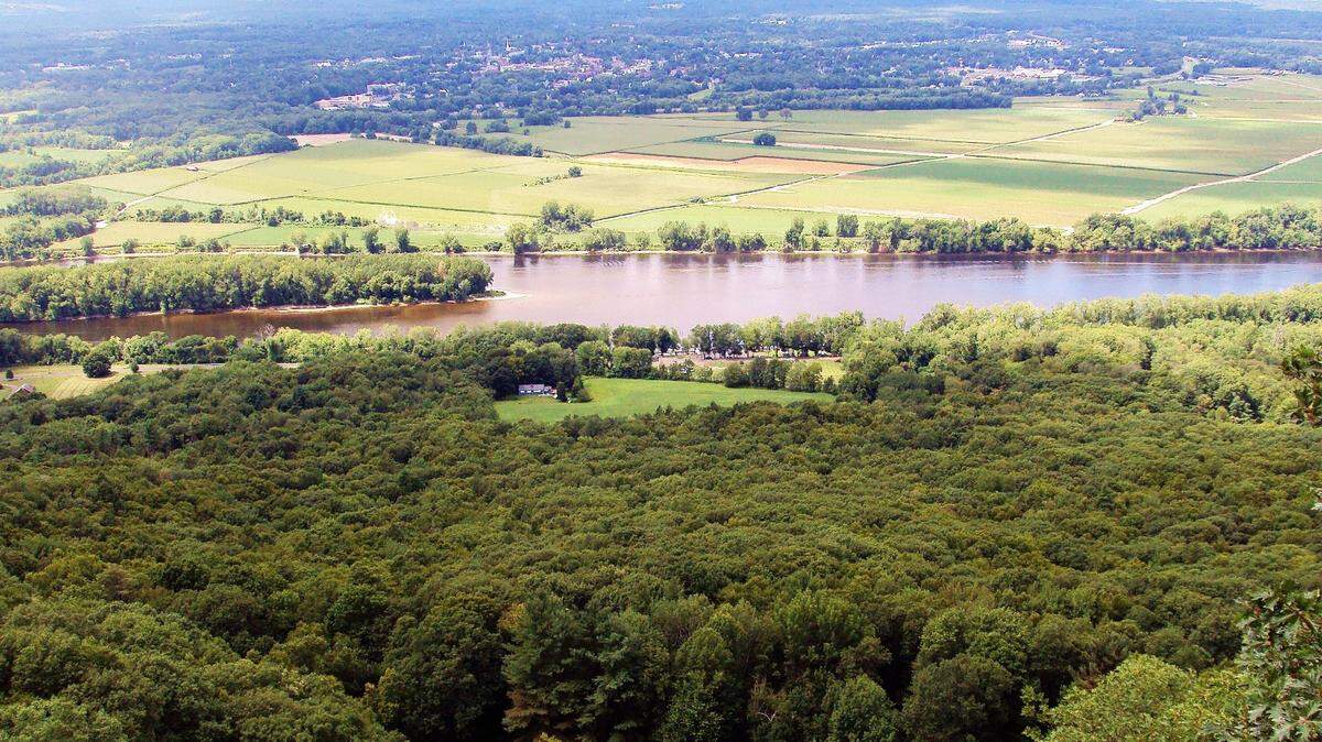 Students with a Massachusetts environmental education center found human remains on an island in the Connecticut River. The medical examiner is working to identify the remains, officials say.
