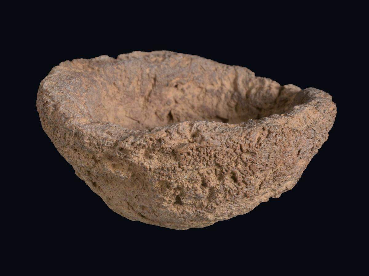 A clay rattle fragment