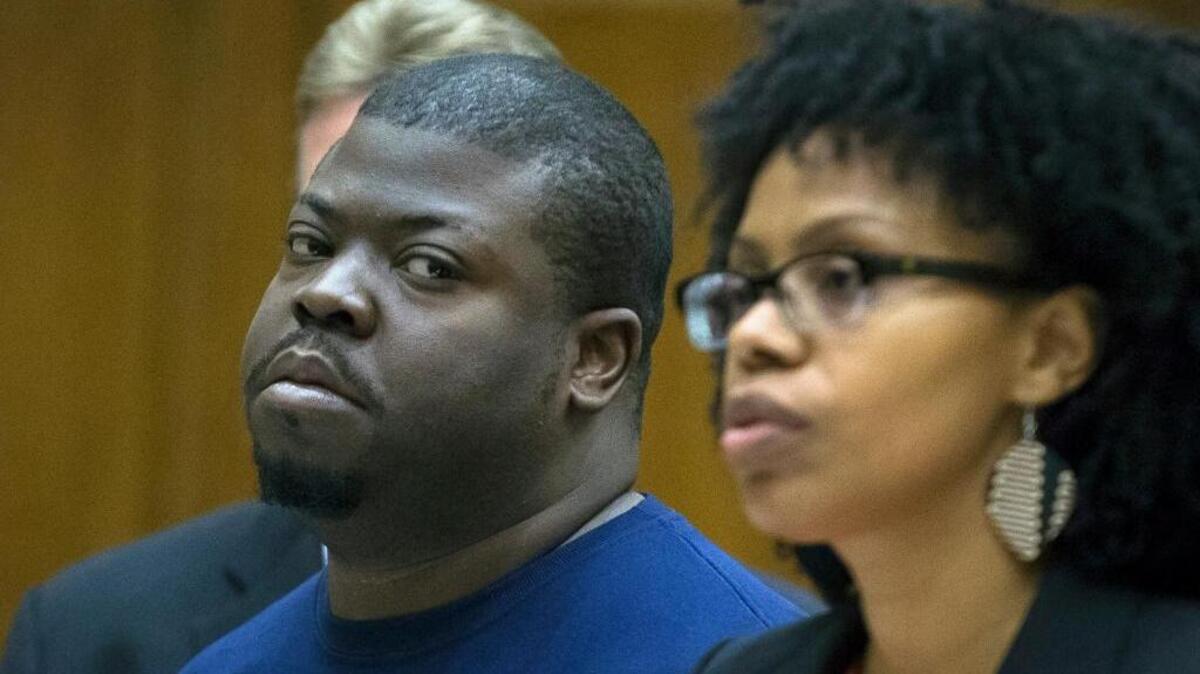 Daniel St. Hubert, now 31, at his June 2014 arraignment in Brooklyn criminal court on murder and attempted murder charges.