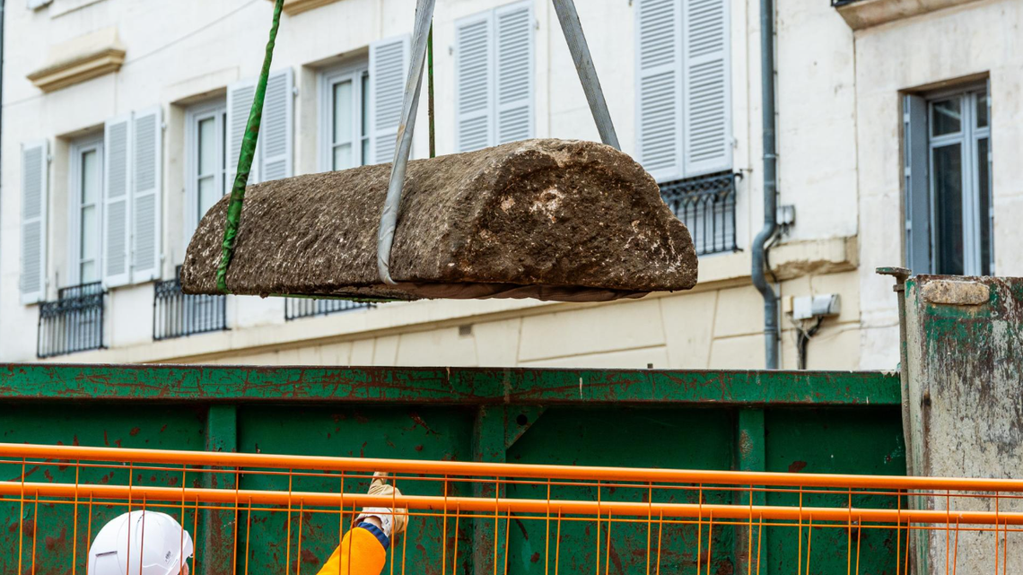 Dozens of medieval graves, including several stone sarcophagi, were discovered below a theater in France, officials said.