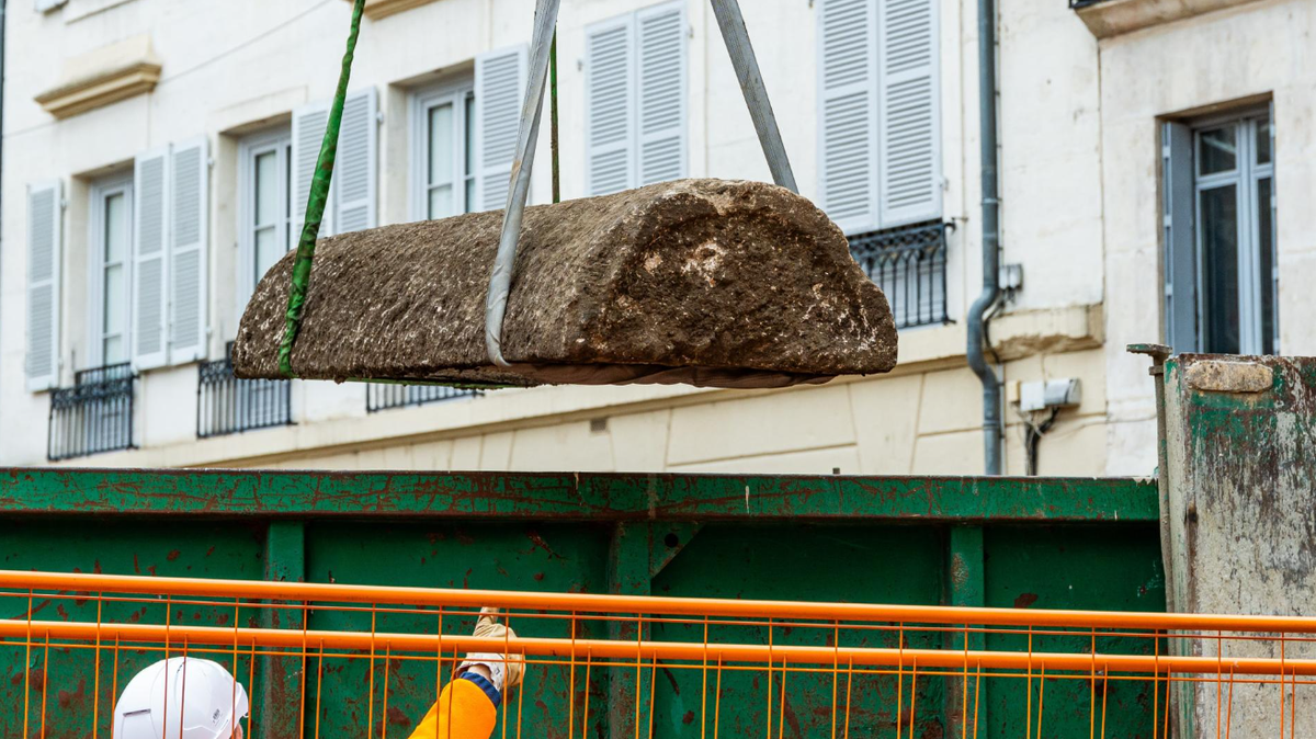 Dozens of medieval graves, including several stone sarcophagi, were discovered below a theater in France, officials said.