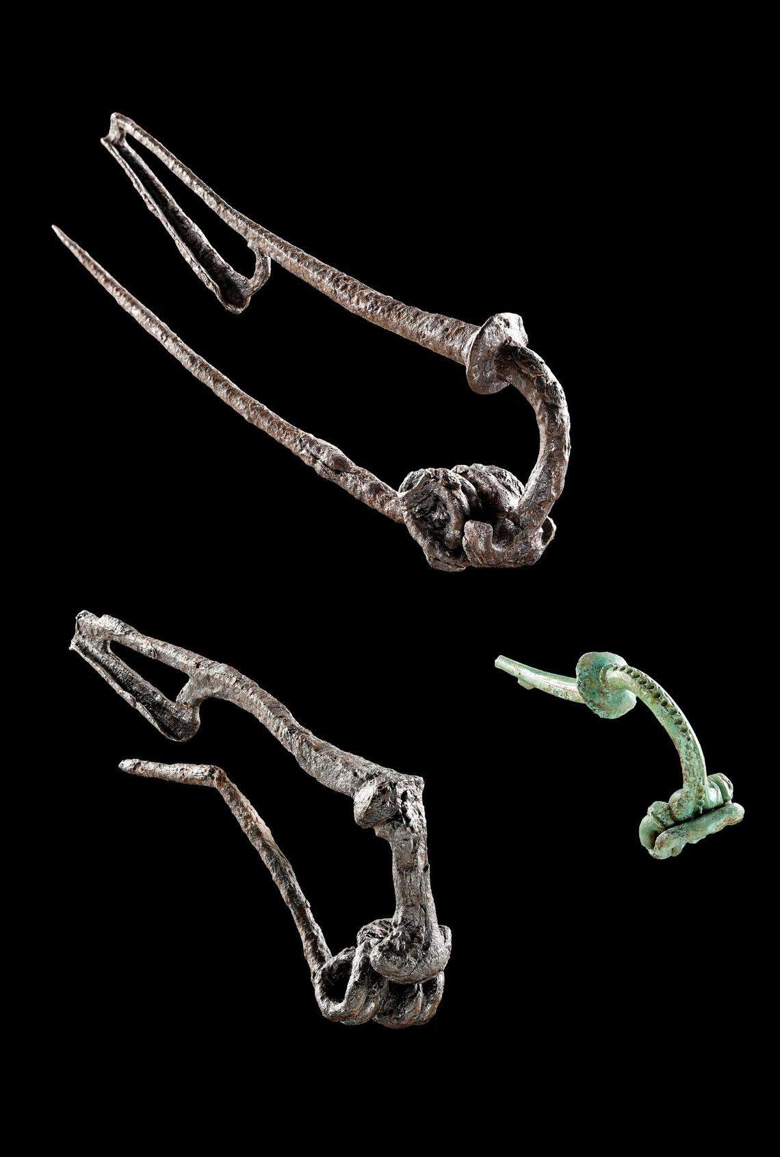 Some ancient garment clasps found at the site.