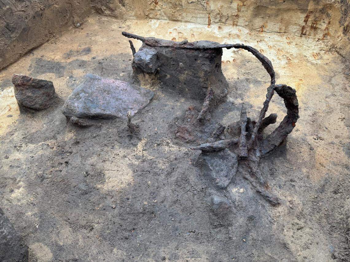 A pile of ancient artifacts seen midway through the excavation.