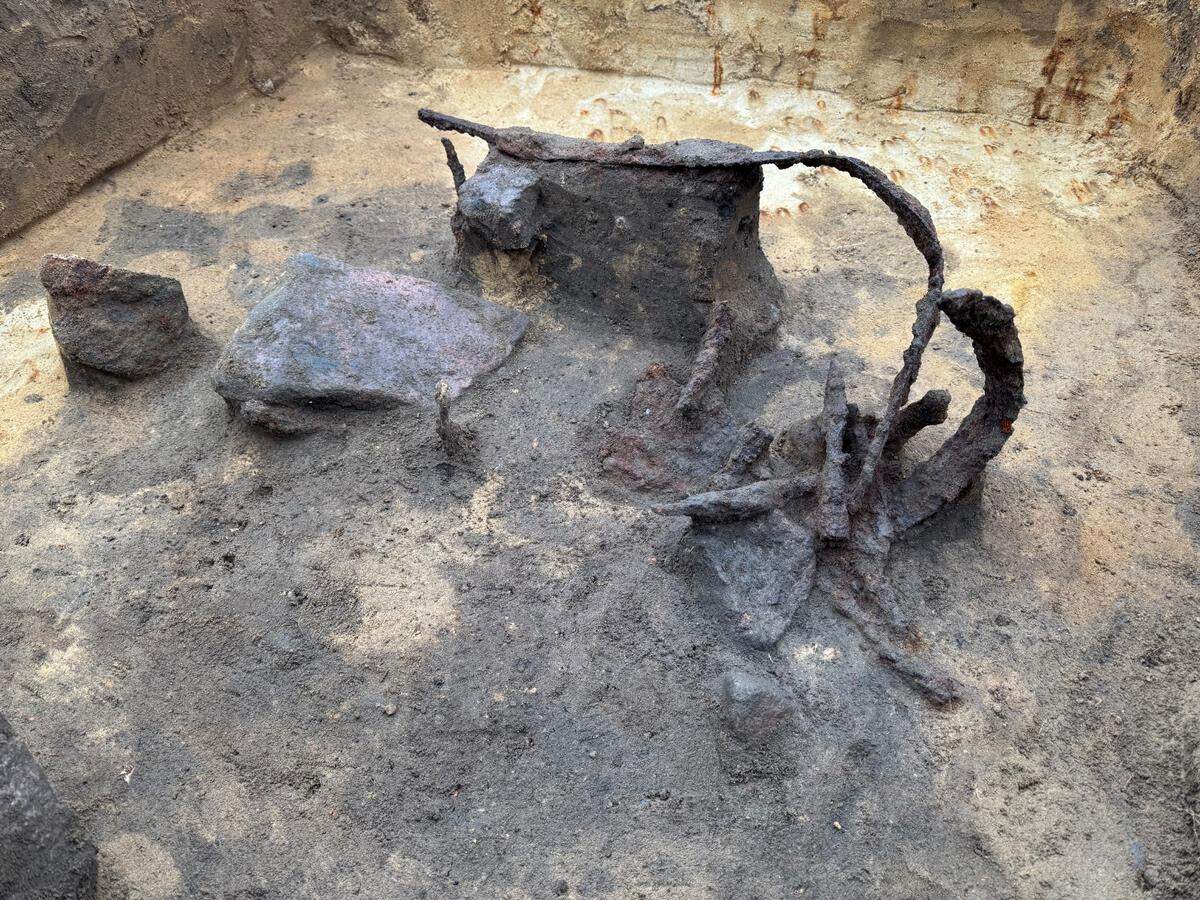A pile of ancient artifacts seen midway through the excavation.