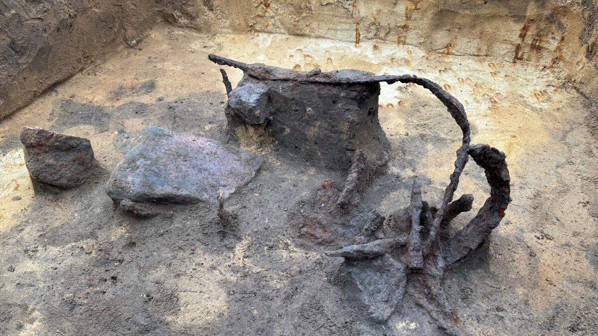 Archaeologists in Denmark found a “rare” Roman helmet buried by an ancient chief along with hundreds of weapons and other artifacts.