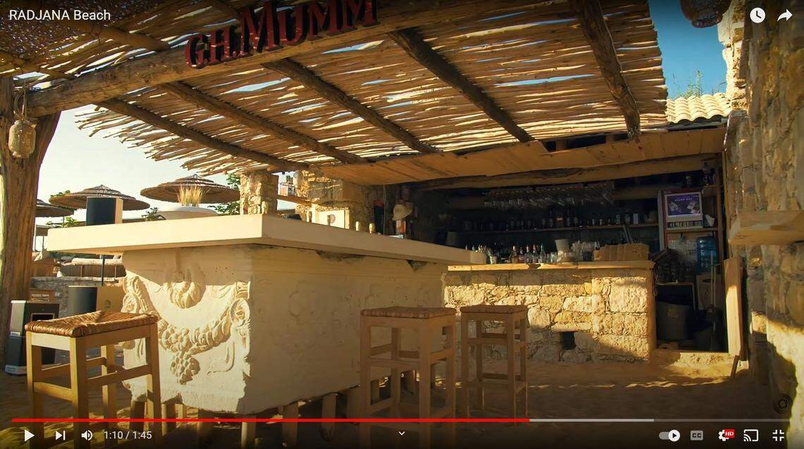 Footage of Radjana Beach from a 2020 promotional video shows a bar table that matches the ancient Roman sarcophagus.