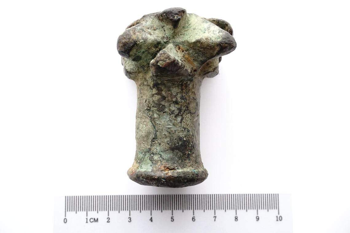 One side of the 600-year-old mace head found by Witold Bołtuć.