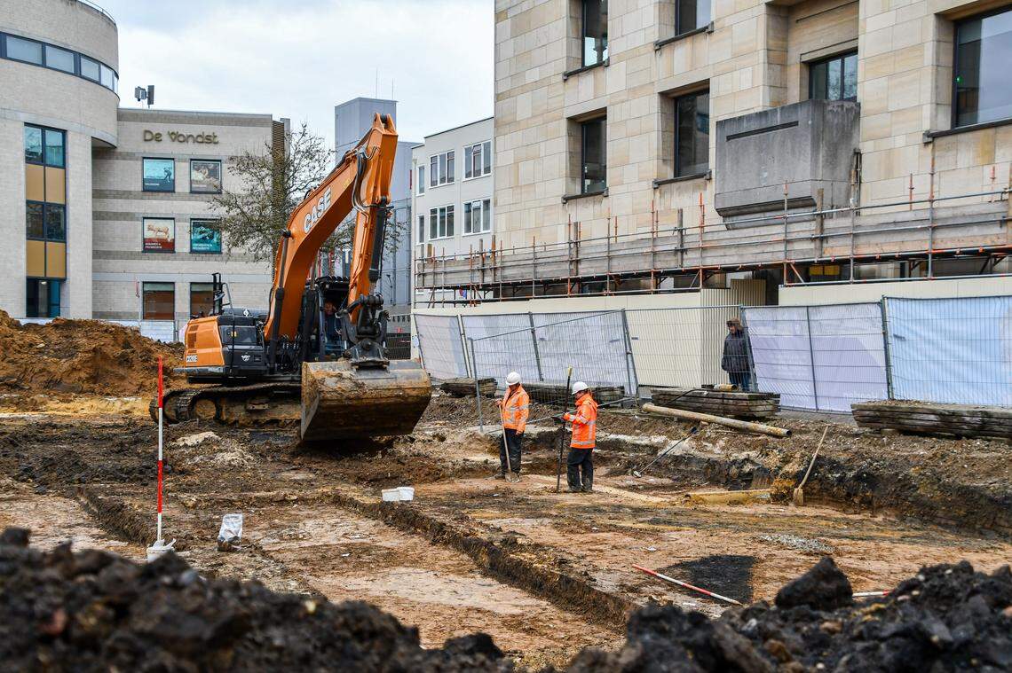 Archaeologists excavating the ancient Roman tomb.